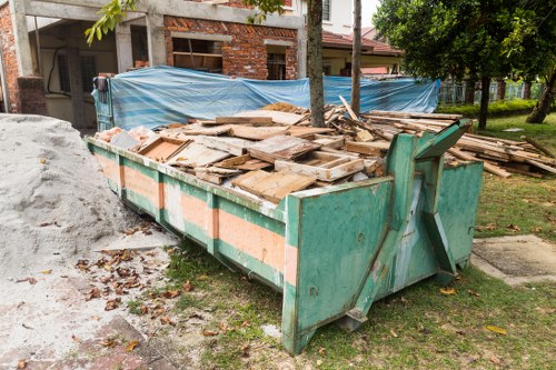 Office clearance team removing furniture in Notting Hill office